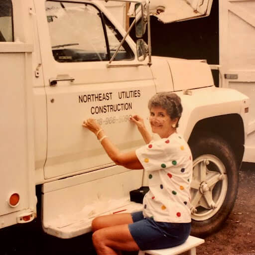 Mrs. Pavilcin puts new lettering onto a company truck circa mid-90s